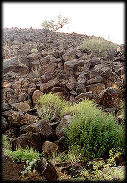 Basalt boulders tumble down a slope at the Deer Valley Rock Art Center, in Phoenix, Arizona.