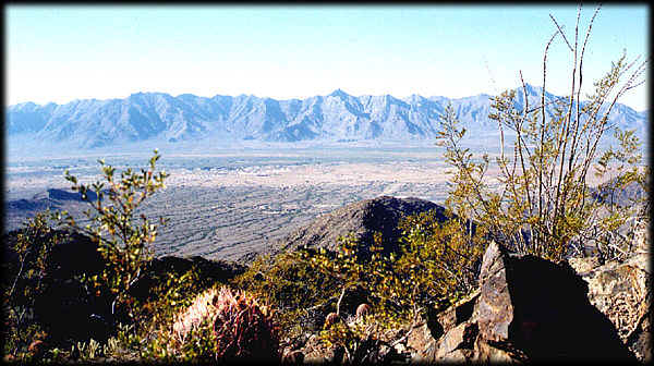 The Sierra Estrella stretch across this view from Alta Ridge in South Mountain Park and Preserve, Phoenix, Arizona.  The Gila River Valley is in the foreground.