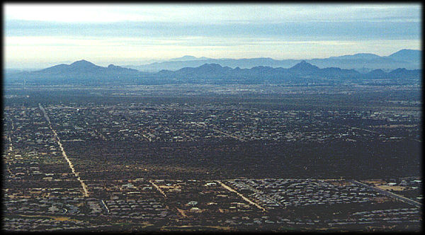 In the distance are the Phoenix Mountains, as seen from the top of Black Mountain, looking south over Phoenix, Arizona.