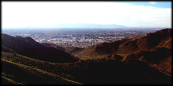 Looking directly west from North Mountain towards the Sun City area and the White Tank Mountains in the distance.